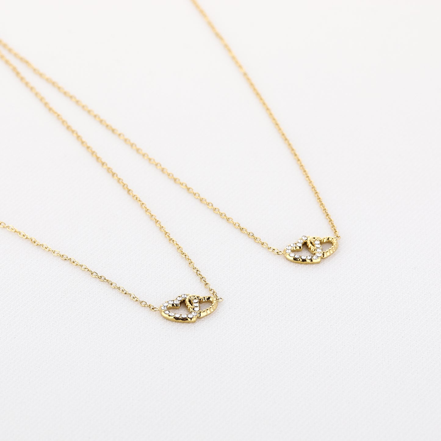 Set van 2 gouden kettingen met hartjes – Forever Connected collectie