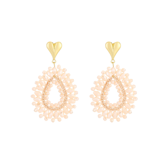 Statement oorbellen met hartvormig detail en druppelvormig design

